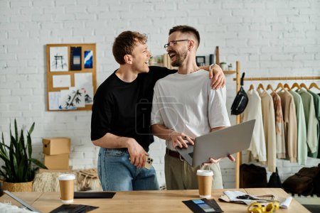 A gay couple collaboratively designs trendy attire in their designer workshop.