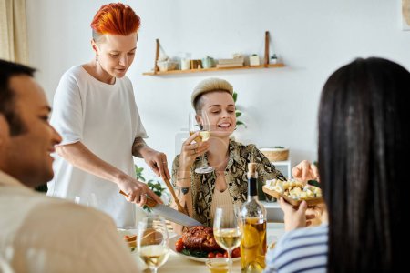 Diverse group enjoys meal together, lesbian couple hosts.