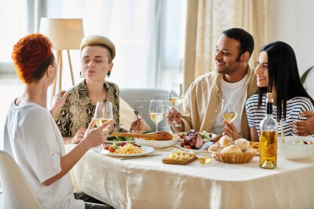 Diverse friends enjoy dinner with a loving lesbian couple at home.