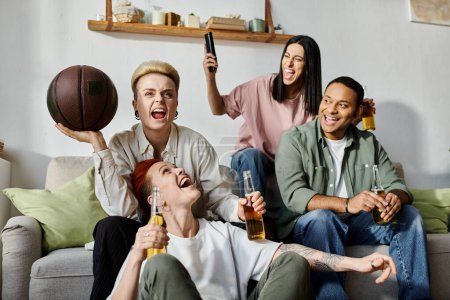 Group of people, including a loving lesbian couple, sitting on top of a couch at home.