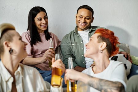 Photo for Diverse group enjoying beer at table. - Royalty Free Image