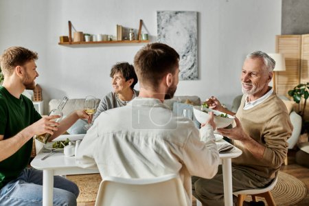 A gay couple and parents enjoy a home-cooked dinner together.