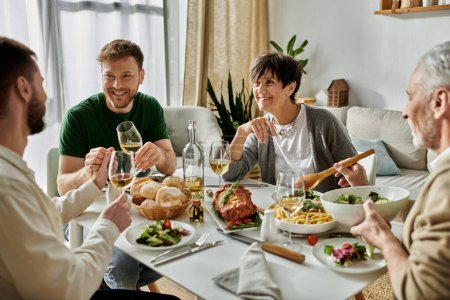 A gay couple shares a meal with parents in a cozy home setting.