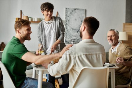 A gay couple enjoys a meal with parents at home.