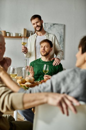 A gay couple enjoys a meal with parents at home, raising a glass in a heartwarming moment of togetherness.