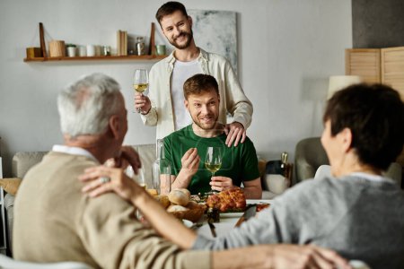 A gay couple introduces their partners to parents during a dinner party at their home.