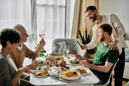 A gay couple introduces their partners to parents during a home-cooked meal.