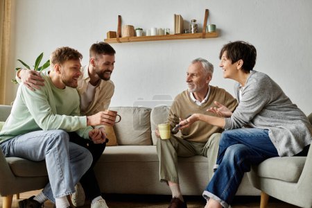 A gay couple sits on a couch with parents, sharing a warm and happy moment.