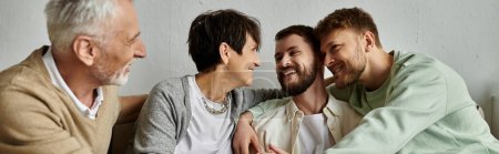 Photo for A gay couple meets with parents in a warm, intimate setting. - Royalty Free Image