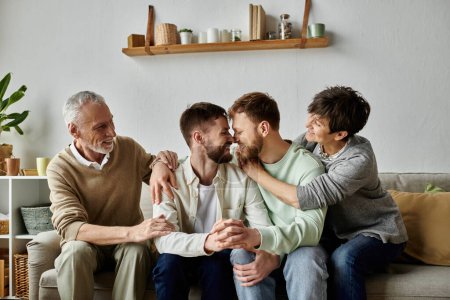 A gay couple sits on a couch with parents, smiling and holding hands.