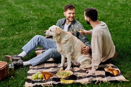 A bearded gay couple enjoys a picnic with their Labrador Retriever in a green park, sharing a bottle of wine and some laughs.