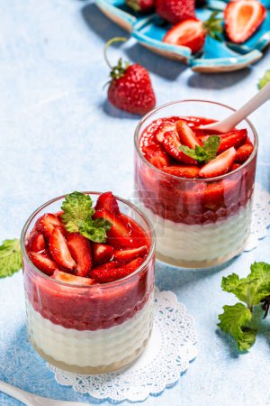 Photo for Traditional italian dessert vanilla strawberry panna cotta. vertical image. top view. place for text. - Royalty Free Image