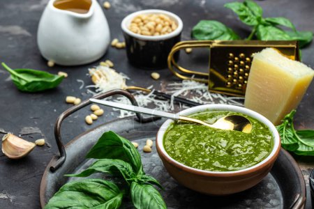 Photo for Traditional Italian pesto Basil, olive oil, parmesan, garlic, pine nuts. banner, menu recipe place for text, top view. - Royalty Free Image