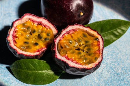 Photo for Set of whole and half of fresh passion fruit. banner, menu, recipe place for text, top view. - Royalty Free Image