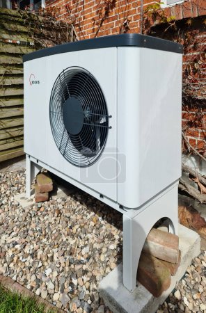 Photo for Kiel, Germany - 13. July 2023: A Solvis brand heat pump in front of a residential building - Royalty Free Image