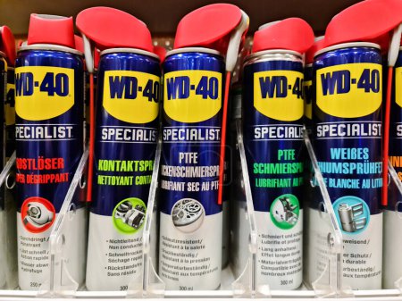 Photo for Kiel, Germany - 12 December 2023: A row of cans of WD-40 rust remover on a DIY store shelf - Royalty Free Image