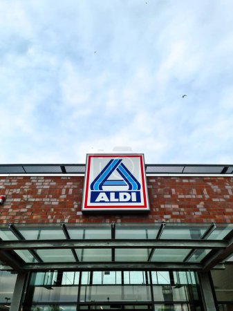 Photo for Kiel, Germany - 04. May 2024: The logo of the discounter chain Aldi above the entrance to a supermarket branch - Royalty Free Image