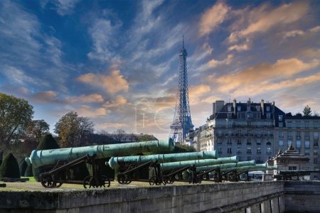 Photo for Paris, the esplanade des Invalides, with cannons, and the Eiffel Tower in background, touristic place - Royalty Free Image