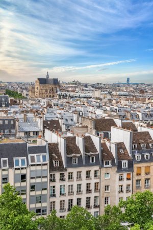 Photo for Paris, typical roofs in the Marais, aerial view with the Halles, the Saint-Eustache church - Royalty Free Image