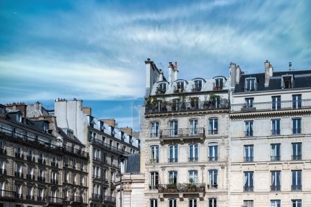 Photo for Paris, ancient buildings, typical parisian facadesrue de Rivoli with a lamppost - Royalty Free Image