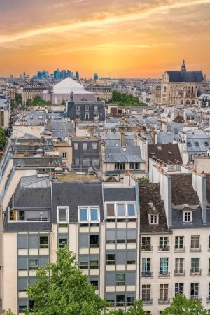 Photo for Paris, typical buildings in the Marais, aerial view with the Saint-Eustache church, and the Defense in background - Royalty Free Image
