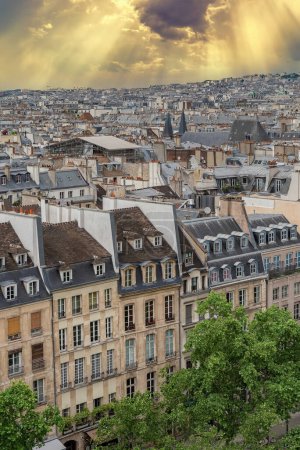 Photo for Paris, typical buildings in the Marais, aerial view with the Saint-Eustache church, and the Defense in background - Royalty Free Image