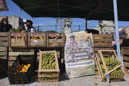 Photo for Buenos Aires, Argentina, 21 sept, 2021: UTT, Land Workers Union, organic vegetable sales stand as part of a protest. Poster text: For a country with food sovereignty. Land Access Law now. - Royalty Free Image