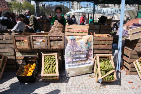 Photo for Buenos Aires, Argentina, 21 sept, 2021: UTT, Land Workers Union, organic vegetable sales stand as part of a protest. Poster text: For a country with food sovereignty. Land Access Law now. - Royalty Free Image
