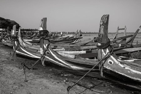 Photo for The wooden fisher boats of the Taungthaman Lake at Mandalay - Royalty Free Image