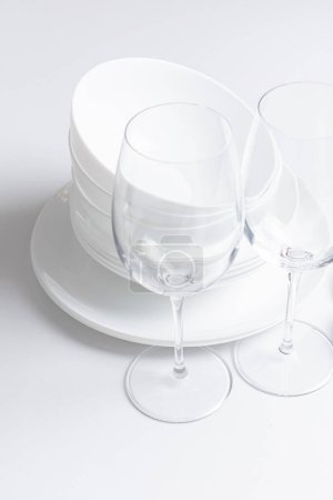 Photo for Sey of white tableware and glasses on a white background - Royalty Free Image