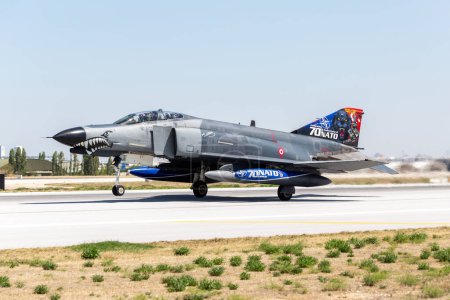 Photo for Konya, Turkey - 07 01 2021: Turkish Air Force McDonnel Douglas F-4 E Phantom II fighter jet in take-off position during Anatolian Eagle Air Force Exercise 2021, Turkey - Royalty Free Image