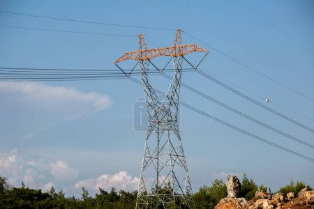 Photo for Symmetrical high voltage electricity poles in Turkey - Royalty Free Image
