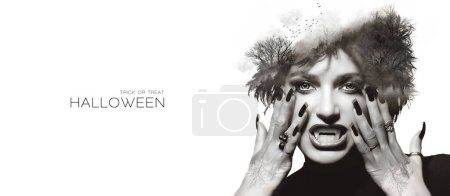 Photo for Halloween cover with a gorgeous Gothic female vampire showing her fangs with her hands raised to cheeks and a double exposure of a birds in flight over a misty deep forest over her forehead in a Halloween concept. Monochrome banner isolated on white - Royalty Free Image