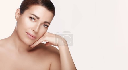 Photo for Beauty and Skin Care Concept. Beautiful natural woman with clean healthy luminous skin. Panorama banner with lateral white copyspace - Royalty Free Image