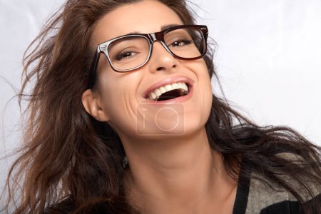 Photo for Beautiful happy woman with eyeglasses. Cool Trendy Eyewear. - Royalty Free Image