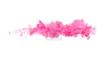 Foto de Closeup of a magenta acrylic ink in water isolated on white. Abstract background. Color explosion - Imagen libre de derechos