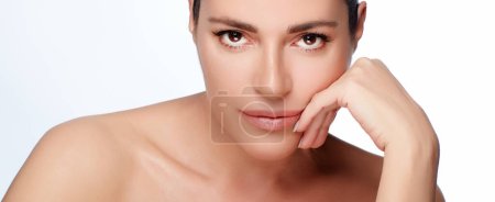 Photo for Skin Care. Natural Woman Face with healthy fresh skin. Close up studio portrait in a panorama banner isolated on white with copy space - Royalty Free Image