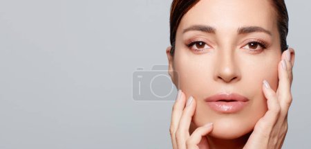 Photo for Beauty and Skincare Concept. Beautiful natural middle age woman with nude makeup on a flawless skin. Beauty Face Spa Woman, - Royalty Free Image