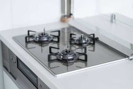 Photo for Close-up of gas stove in system kitchen - Royalty Free Image