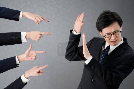 Photo for Asian businessman blamed at work - Royalty Free Image