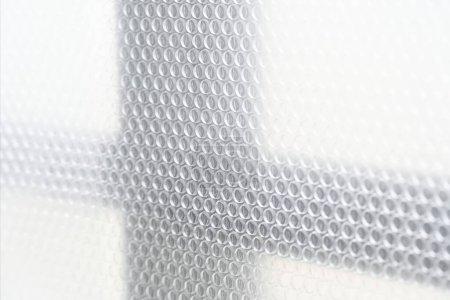Foto de Ventanas de doble acristalamiento hechas de papel de burbuja - Imagen libre de derechos