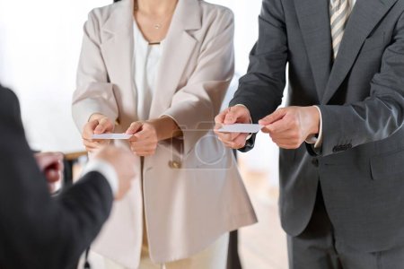 Business people conducting etiquette training