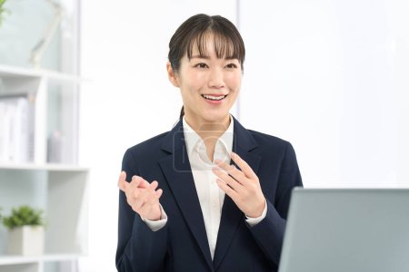 Business woman having business negotiations with a smile