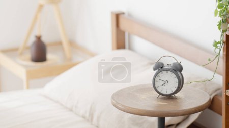 Unattended bed and alarm clock