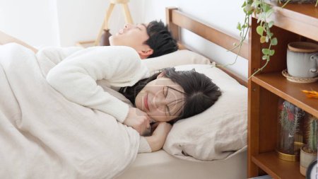 Woman unable to sleep due to loud snoring