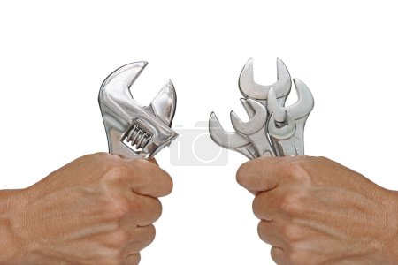 Photo for Hand Holding Adjustable Wrench and Several Size of Spanners illustrated the Multitasking versus Monotasking People Concept Abstract - Royalty Free Image
