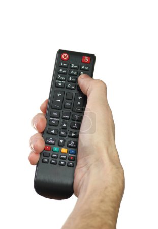 Téléchargez les photos : Tv remote control held in hand isolated on white background - en image libre de droit