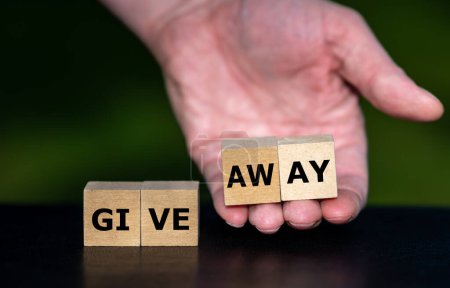 Cubes form the expression 'give away'.