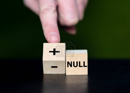 Photo for Cubes form the German saying 'plus minus null' (plus minus zero). Meaning that you do not have any benefits or any debts. - Royalty Free Image