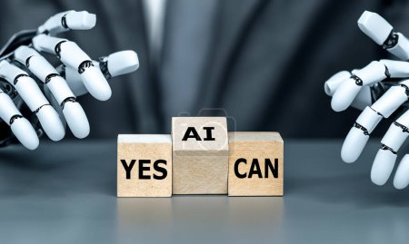 Robot hand turns cube and puts the letter 'AI' in to the expression'yes AI can'. Symbol that artificial intelligence technology is capable of something.